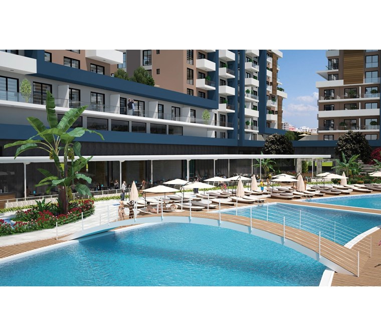 İskele Long Beach Riverside Life'da Tam Eşyalı 2+1 Satılık Daire
