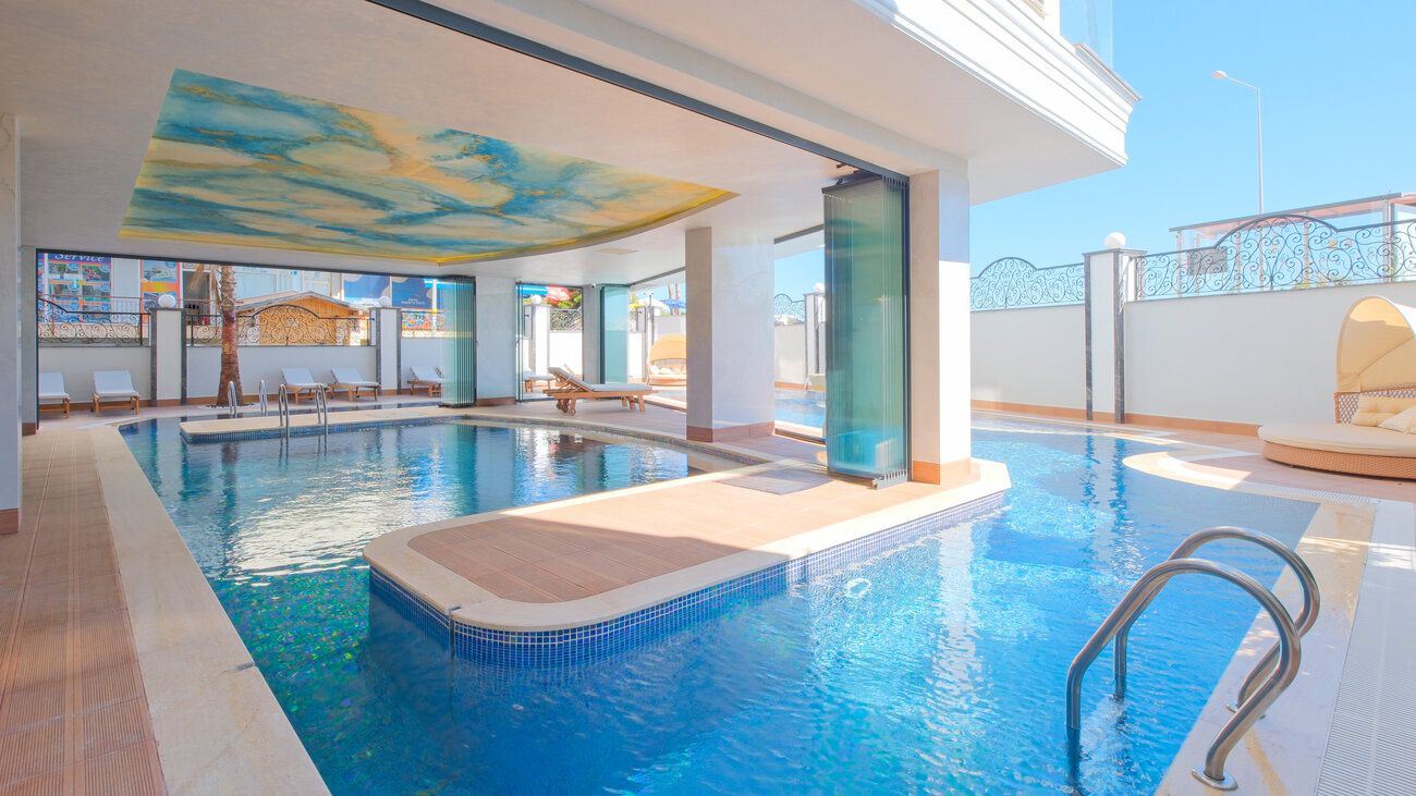 FULLY FURNISHED 3+1 SEAFRONT APARTMENT FOR SALE WITH SEA VIEW IN ALANYA CENTER · 30 · Photos