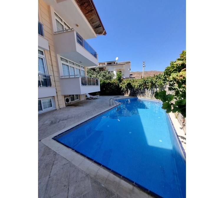 MÜJGAN EMLAKTAN MARMARİS İÇMELERDE HAVUZLU EŞYALI KİRALIK DUBLEKS