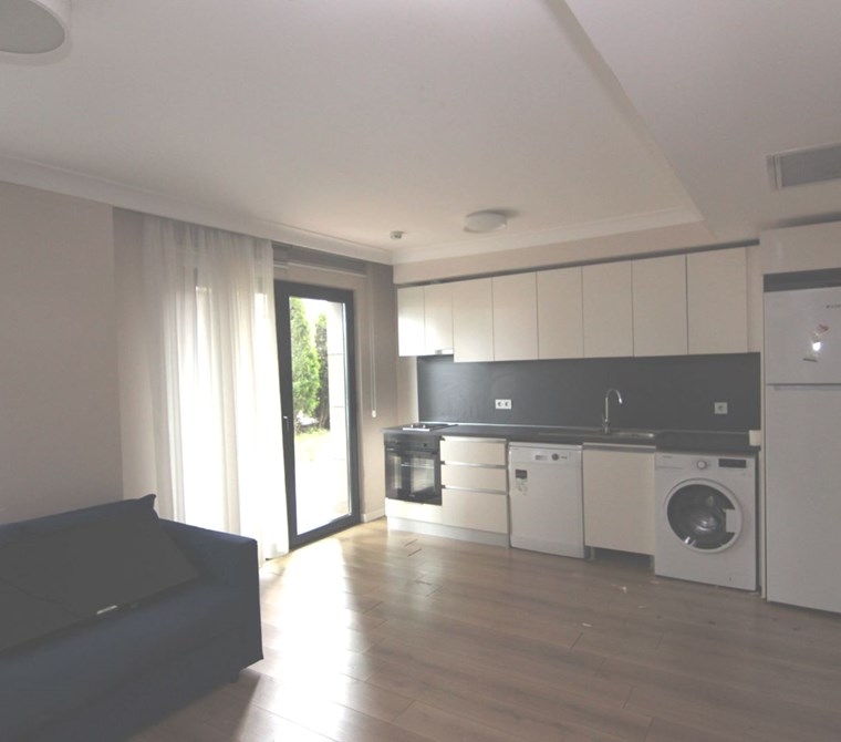 KOÇ BATI YURDUNA KOMŞU KİRALIK 1+1 BAHÇELİ DAİRE