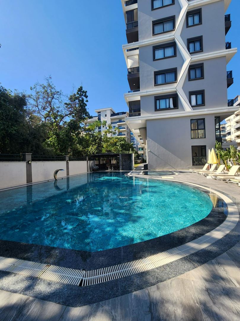ALANYA MAHMUTLARDA DENİZ MANZARALI FULL EŞYALI 1+1 SATILIK DAİRE