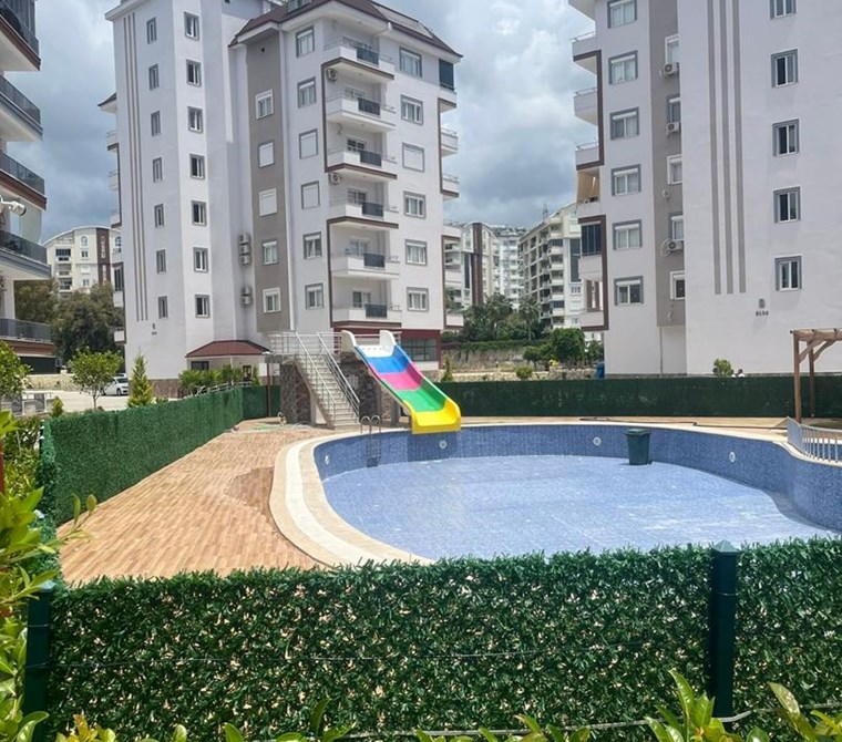 Luxury 1+1 Apartment for Sale in Avsallar Center, with Occupancy Permit and Social Amenities.